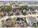 Neighborhood aerial view showcases a community of lovely homes with mature trees and manicured lawns at 13121 Sargas St, Raleigh, NC 27614