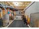 Unfinished basement with concrete walls, utilities, carpet, and plenty of storage space at 13121 Sargas St, Raleigh, NC 27614