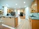 Large kitchen with a breakfast bar, ample counter space, and modern appliances at 13121 Sargas St, Raleigh, NC 27614