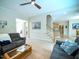Inviting living room with hardwood floors, comfortable seating, and an open layout at 13121 Sargas St, Raleigh, NC 27614