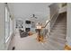 Inviting living room with fireplace, built-in shelving, and cozy seating area at 13121 Sargas St, Raleigh, NC 27614