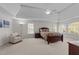 Spacious main bedroom featuring tray ceilings and lots of natural light at 13121 Sargas St, Raleigh, NC 27614