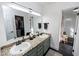 Stylish bathroom featuring a double vanity with granite countertops and a separate tiled shower at 1617 Jenkins Rd, Wake Forest, NC 27587