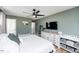 Bedroom featuring neutral paint color, wood-look floors, ceiling fan and natural light at 1617 Jenkins Rd, Wake Forest, NC 27587
