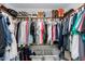 Spacious walk-in closet with ample storage, shelves for shoes, and clothing racks at 1617 Jenkins Rd, Wake Forest, NC 27587