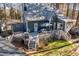A view of the decks of this beautiful home, with outdoor seating, a grill, and brick walkway at 1617 Jenkins Rd, Wake Forest, NC 27587