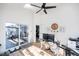 Home office with hardwood floors, modern desk, and sliding glass door to the patio at 1617 Jenkins Rd, Wake Forest, NC 27587