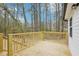 Newly built back deck overlooks a wooded yard at 1911 Stadium Dr, Durham, NC 27705