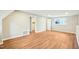 Bonus room featuring wood flooring, neutral paint, recessed lighting, bright windows, and doorways at 1911 Stadium Dr, Durham, NC 27705