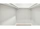 Walk-in closet featuring wood flooring and shelf supports at 1911 Stadium Dr, Durham, NC 27705