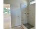 Bathroom with marble-tiled shower with built-in shelves at 1912 Harrell Cove Ct # 171 Gunnison Cr, Fuquay Varina, NC 27526