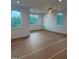 Spacious bedroom with large windows offering natural light and views, providing a serene and inviting atmosphere at 1912 Harrell Cove Ct # 171 Gunnison Cr, Fuquay Varina, NC 27526