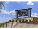 Sign for High Grove Oaks community with manicured landscaping at 1912 Harrell Cove Ct # 171 Gunnison Cr, Fuquay Varina, NC 27526