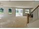 Spacious living room featuring large windows, recessed lighting, and an open floor plan at 1912 Harrell Cove Ct # 171 Gunnison Cr, Fuquay Varina, NC 27526