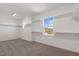 Walk-in closet with carpet flooring, white walls, shelving, and a window at 1912 Harrell Cove Ct # 171 Gunnison Cr, Fuquay Varina, NC 27526