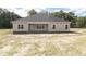 Home with level backyard and covered patio at 20 Watermelon Dr, Franklinton, NC 27525