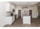 Close-up of the kitchen featuring stainless steel appliances and granite countertops at 20 Watermelon Dr, Franklinton, NC 27525