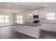 Bright kitchen with white cabinets, granite countertops, and stainless steel appliances at 20 Watermelon Dr, Franklinton, NC 27525