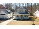 An aerial shot showcases this lovely home with its inviting front porch and neat landscaping at 206 Pine St, Fuquay Varina, NC 27526