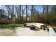 Outdoor patio with fire pit and comfortable sectional, ideal for gatherings and relaxation at 206 Pine St, Fuquay Varina, NC 27526