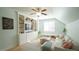 Bonus room featuring vaulted ceilings, custom built-ins, and plenty of natural light at 206 Pine St, Fuquay Varina, NC 27526