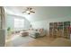 Bonus room featuring vaulted ceilings, custom built-ins, and plenty of natural light at 206 Pine St, Fuquay Varina, NC 27526