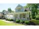 Inviting home with a lovely front porch, perfect for relaxing outdoors at 206 Pine St, Fuquay Varina, NC 27526
