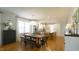 Spacious kitchen and dining area with hardwood floors, stainless steel appliances, and ample counter space at 206 Pine St, Fuquay Varina, NC 27526