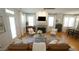 Inviting living room with fireplace, hardwood floors, and an open layout perfect for entertaining at 206 Pine St, Fuquay Varina, NC 27526