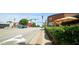 Street view featuring restaurants and tree-lined sidewalk, complete with yellow traffic lines at 206 Pine St, Fuquay Varina, NC 27526