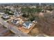 New construction homes feature modern design and landscaping in a developing community at 207 Holleman St, Apex, NC 27502