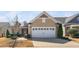Attractive single Gathering home with a two-car garage and well-maintained landscaping at 216 Kalmia Dr, Durham, NC 27703