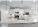 Bright kitchen with granite countertops, stainless steel appliances, and white subway tile at 216 Kalmia Dr, Durham, NC 27703