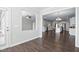 Open concept living area and a glimpse into a modern kitchen at 216 Kalmia Dr, Durham, NC 27703