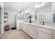 Bright and spacious main bathroom featuring double vanity, shower, and ample storage, creating a spa-like retreat at 2404 Glade Mill Ct, Fuquay Varina, NC 27526