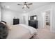 Another angle of spacious main bedroom with neutral decor, ample closet space, and private ensuite access at 2404 Glade Mill Ct, Fuquay Varina, NC 27526