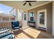 Charming porch featuring wooden floors, furniture, and a ceiling fan at 2404 Glade Mill Ct, Fuquay Varina, NC 27526