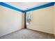 Empty bedroom with natural light from a window and blue trim at 2428 Havershire Dr, Raleigh, NC 27613
