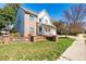 Brick home featuring blue shutters, an attached garage, a well-kept lawn, and 'North Park' sign at 2428 Havershire Dr, Raleigh, NC 27613