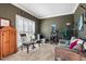 Cozy living room showcasing plantation shutters, elegant decor, and comfortable seating at 2428 Havershire Dr, Raleigh, NC 27613