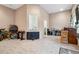 Spacious, naturally lit living room with neutral carpet, a bike, and room to gather and entertain at 2428 Havershire Dr, Raleigh, NC 27613