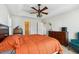 Inviting main bedroom with a ceiling fan, a ceiling tray and ensuite bathroom at 2428 Havershire Dr, Raleigh, NC 27613