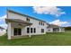 Expansive backyard with covered patio, perfect for outdoor gatherings and activities at 265 Umstead St, Sanford, NC 27330