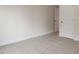 A carpeted room with two doors, neutral walls and white trim at 265 Umstead St, Sanford, NC 27330