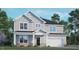Charming two-story home featuring a classic gray exterior, well-manicured lawn and a welcoming covered front porch at 265 Umstead St, Sanford, NC 27330