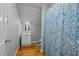 Cozy bathroom featuring a decorative shower curtain, vanity with sink, and tiled flooring for a clean design at 3307 Altamahaw Church St, Elon, NC 27244
