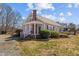 Charming two-story home with a cozy front porch and well-maintained landscaping at 3307 Altamahaw Church St, Elon, NC 27244