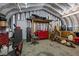 Large garage features ample storage space, work area, and a corrugated metal interior at 3307 Altamahaw Church St, Elon, NC 27244