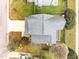 Aerial view of the home showcasing the roof, backyard deck, driveway, and landscaped front yard at 3809 Mardela Spring Dr, Raleigh, NC 27616
