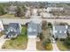Aerial view of the property featuring the home's layout, roof, front yard, and surrounding neighborhood at 3809 Mardela Spring Dr, Raleigh, NC 27616